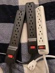 Prime 6-OUTLET Surge Protectors Black & White Ft Cord Reset Switch. Fixed Price $15.00.