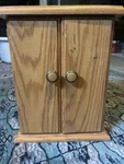 Oak Multimedia Storage Cabinet. Fixed Price $35.00.