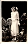 Rppc Postcard 1920S Flapper Woman Studio Portrait Wicker Chair Flowers. Fixed Price $19.99.