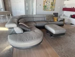 Natuzzi Style Italian Leather Curved Sectional Sofa + Ottoman Modern Gray. Fixed Price $4300.00.