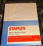 Staples 12 Pack Writing PAD-50 Sheets. Fixed Price $12.00.