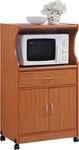 Hodedah Microwave Cart W/one Drawer Two Doors And Shelf Storage, Cherry. Fixed Price $211.79.