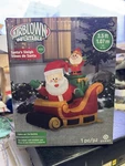 Gemmy Christmas Airblown Inflatable Santa And Elf Sleigh, 3.5 Ft. Fixed Price $39.99.