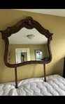Antique Arched Ornate Wood Framed Mirror Brass Decorative Medallion. Fixed Price $300.00.