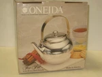 Nos Oneida Silverplated Tea Pot With Brass Bail Handle Usa Made. Fixed Price $50.00.
