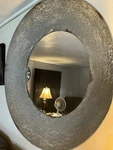 Round Silver Framed Wall Mirror With Textured - By Ashley Furniture. Fixed Price $90.00.