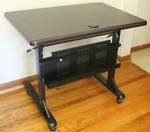 Balt Flipper Flip-top Table 36"W X 24"D. Fixed Price $220.00.