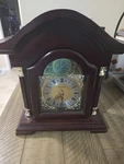 Bedford Clock Collection Redwood Mantel With Chimes. Fixed Price $75.00.