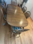 Solid Oak Medium Brown Wood Rectangular Dining Table Set. Fixed Price $550.00.