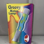 Creative Motion Wavy Lamp: Yellow Wax, Blue Liquid: 16 New. Fixed Price $75.00.