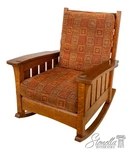 69933: Stickley Upholstered Large Mission Oak Rocking Chair. Fixed Price $2395.00.