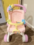 Fisher-price Brilliant Basics Stroll-along Walker Pink Baby Doll Stroller Toy. Fixed Price $39.00.